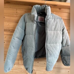 cropped levi light blue winter jacket.